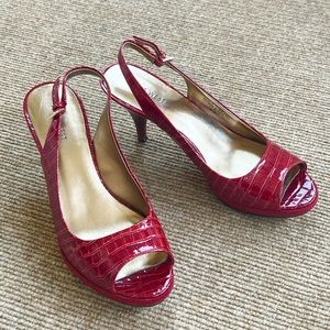 Nine West patent leather peep toe heels.  Red.  Size 8.5